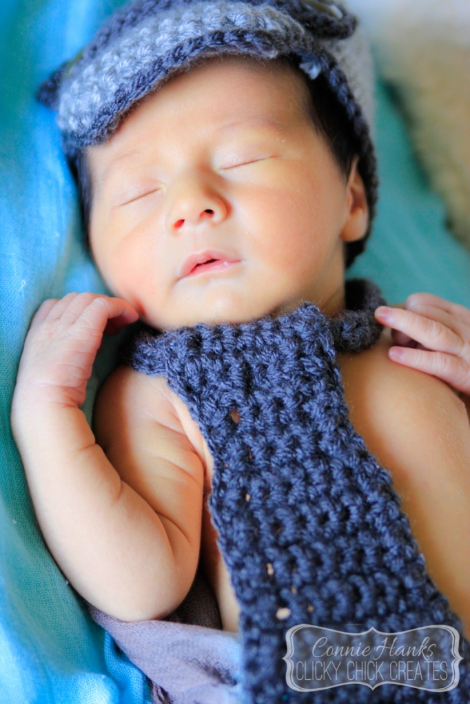 Connie Hanks Photography // ClickyChickCreates.com // newborn session, swaddle, love, young family, bohemian, boho chic, sleeping baby, tie, hat