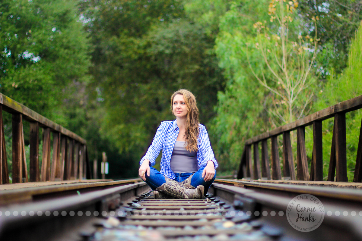 Connie Hanks Photography // ClickyChickCreates.com // rustic, train, tracks, cowboy, cowgirl, boots, lines, perspective