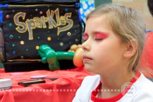 Connie Hanks Photography // ClickyChickCreates.com // JOY in the face of a 7-year old getting her face painted!
