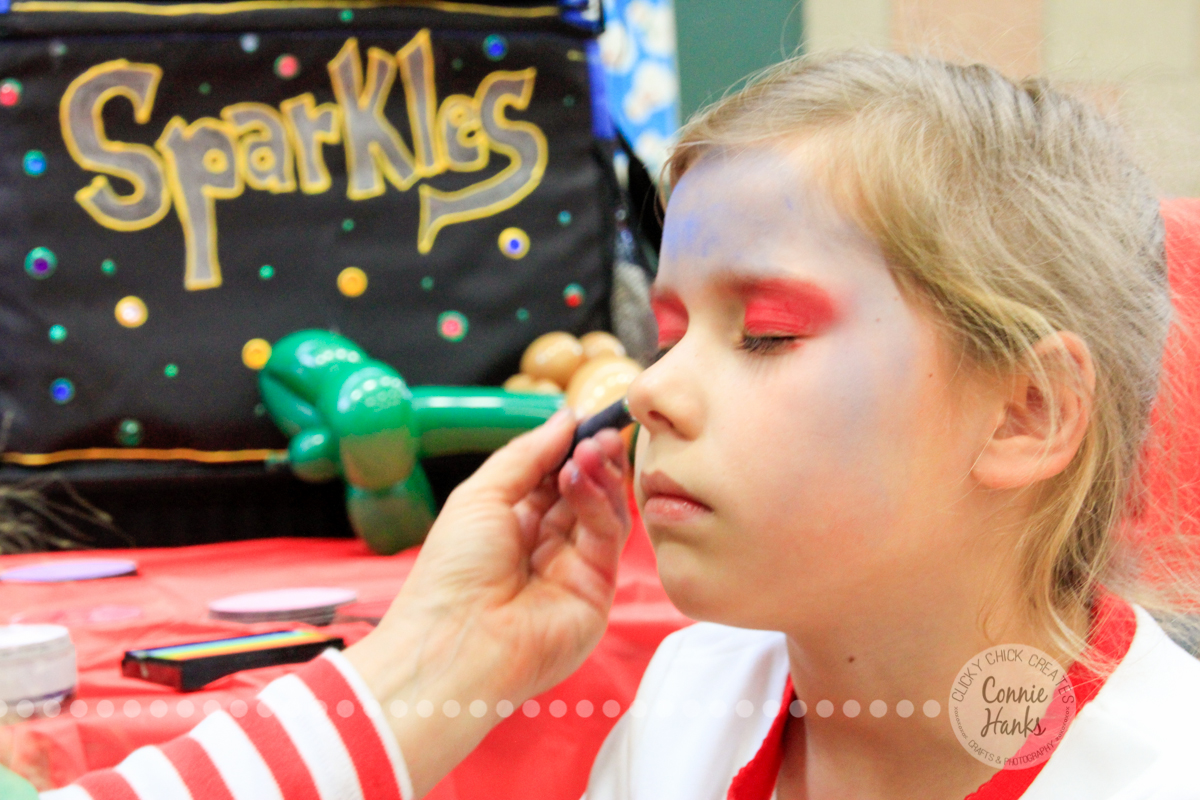 Connie Hanks Photography // ClickyChickCreates.com // JOY in the face of a 7-year old getting her face painted!