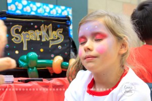 Connie Hanks Photography // ClickyChickCreates.com // JOY in the face of a 7-year old getting her face painted!