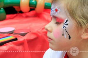 Connie Hanks Photography // ClickyChickCreates.com // JOY in the face of a 7-year old getting her face painted!