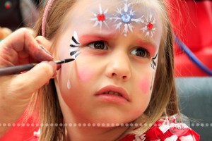 Connie Hanks Photography // ClickyChickCreates.com // JOY in the face of a 4-year old getting her face painted!