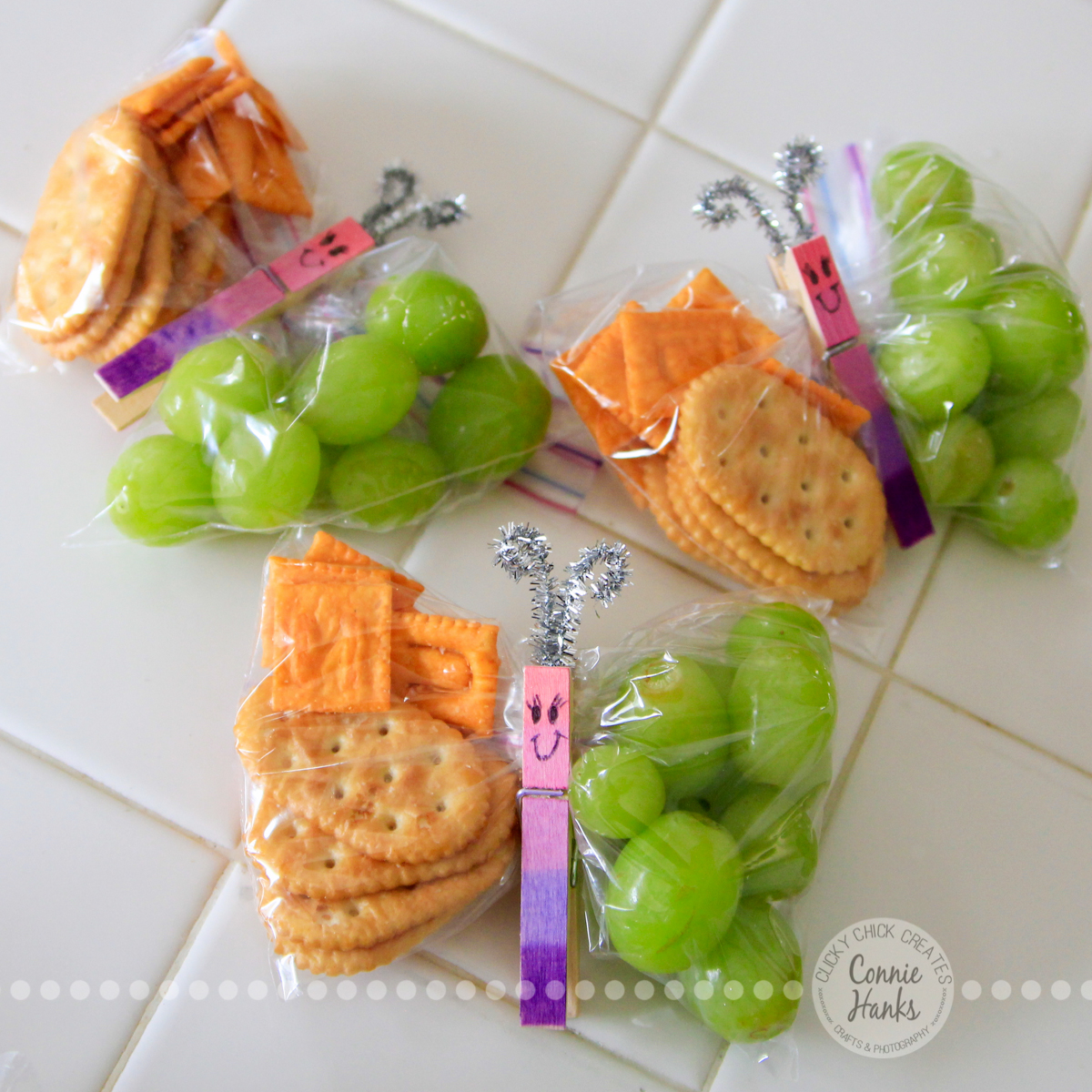 Connie Hanks Photography // ClickyChickCreates.com // healthy butterfly snacks made with baggies, clothes pins, pipe cleaner, grapes, fruit, crackers