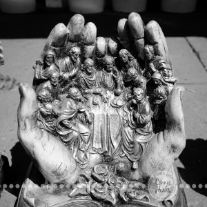 Connie Hanks Photography // ClickyChickCreates.com // engagement couple session, Rosarito, Mexico, mercado, market, colorful, turquoise, blue, gray, wood, wheel, rustic, arches, archways, kiss, last supper, hands