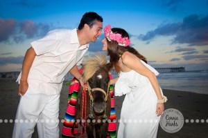 Connie Hanks Photography // ClickyChickCreates.com // engagement couple session, Rosarito, Mexico beach, pony, flower head wreath