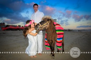 Connie Hanks Photography // ClickyChickCreates.com // engagement couple session, Rosarito, Mexico beach, pony, flower head wreath