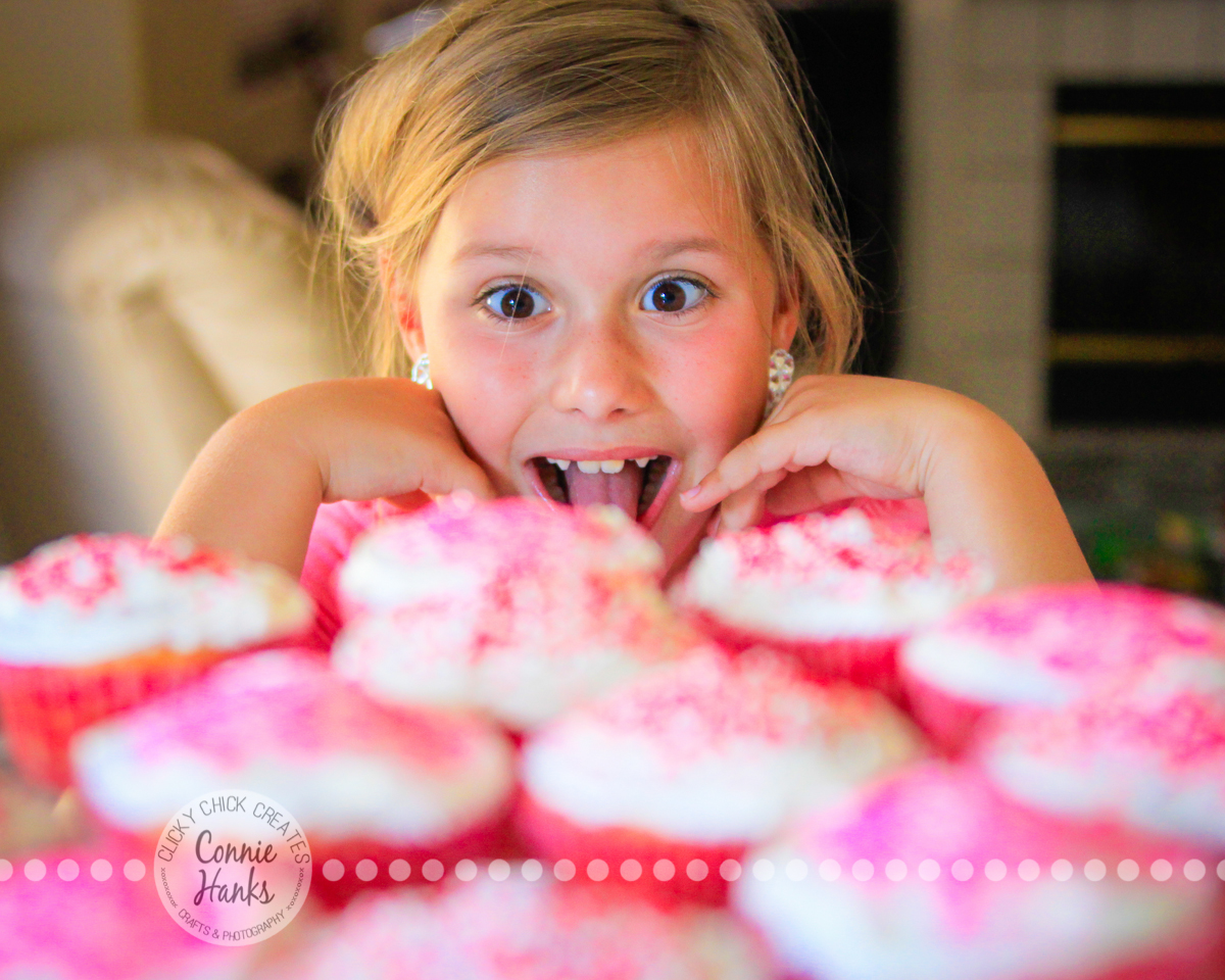 Connie Hanks Photography // ClickyChickCreates.com // Little girl with platter of cupcakes, in awe and ready to devour