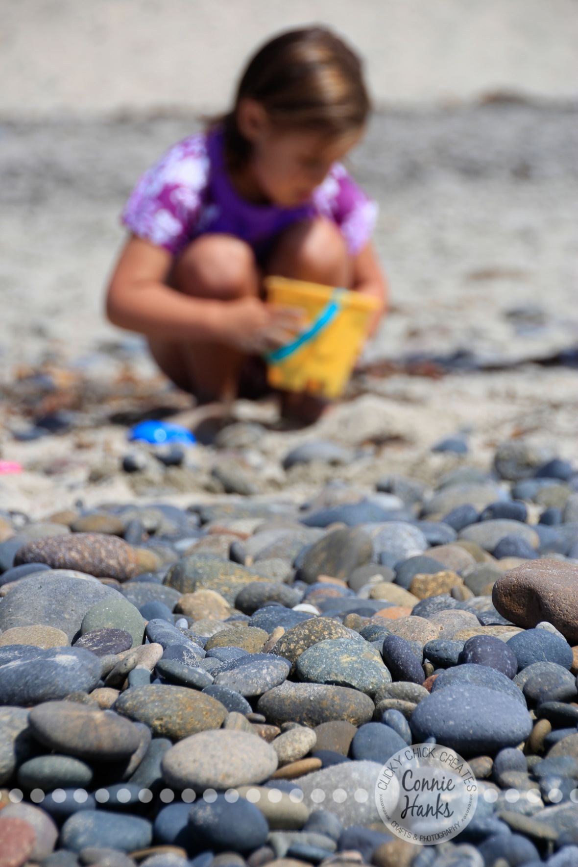 Connie Hanks Photography // ClickyChickCreates.com // beach rocks, pail, and family beach day in San Diego, CA