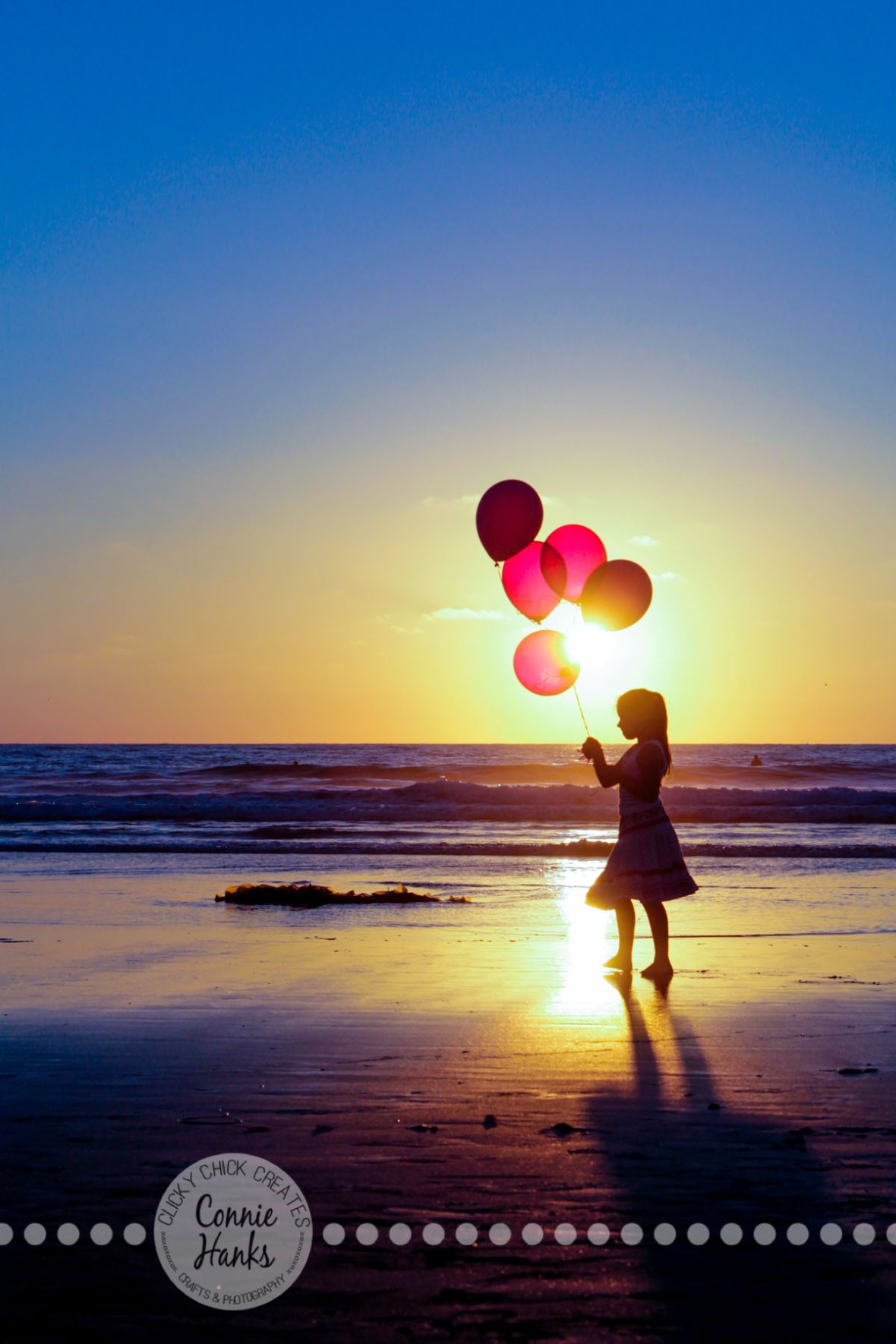 Connie Hanks Photography // ClickyChickCreates.com // Beach Silhouette, sisters, daughters, girls, kids, beach, sunset, jump, balloons, Pacific Ocean, La Jolla Shores
