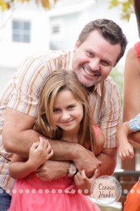 Connie Hanks Photography // ClickyChickCreates.com // Family Photography, Old Poway Park, rustic, park, train, tracks, grass, siblings, coordinated family, salmon, orange, pink, lovely