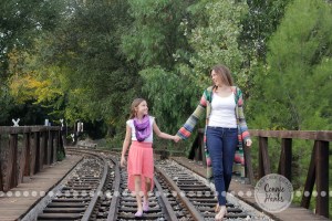 Connie Hanks Photography // ClickyChickCreates.com // Family Photography, mother, daughter, rustic, park, train tracks, train car, coordinated family, oranges, purples, colorful, lovely