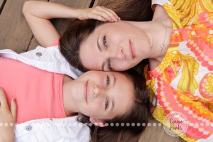 Connie Hanks Photography // ClickyChickCreates.com // Family Photography, mother, daughter, rustic, park, train tracks, train car, coordinated family, oranges, purples, colorful, lovely