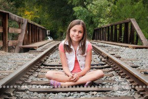 Connie Hanks Photography // ClickyChickCreates.com // Family Photography, mother, daughter, rustic, park, train tracks, train car, coordinated family, oranges, purples, colorful, lovely